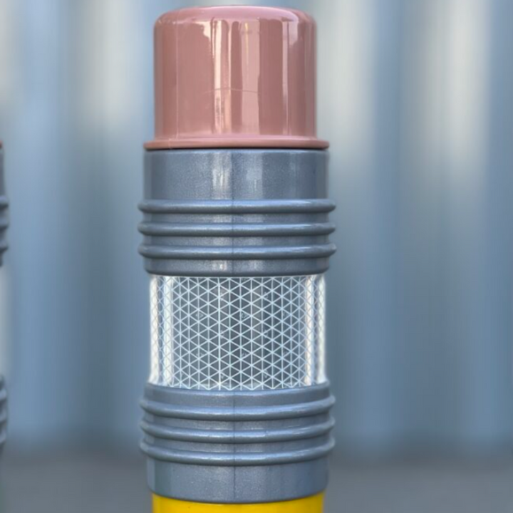 Close-up of a flexible yellow crayon bollard.